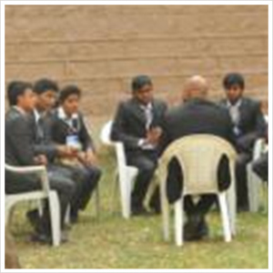 Westin-college-principal-interacting-with-students

